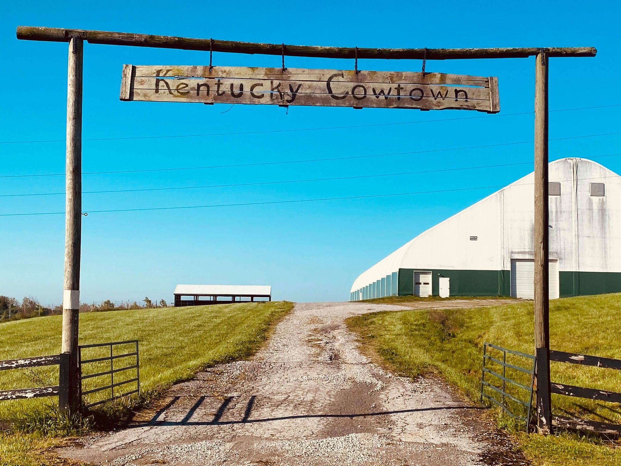kentucky cowtown entrance sign post